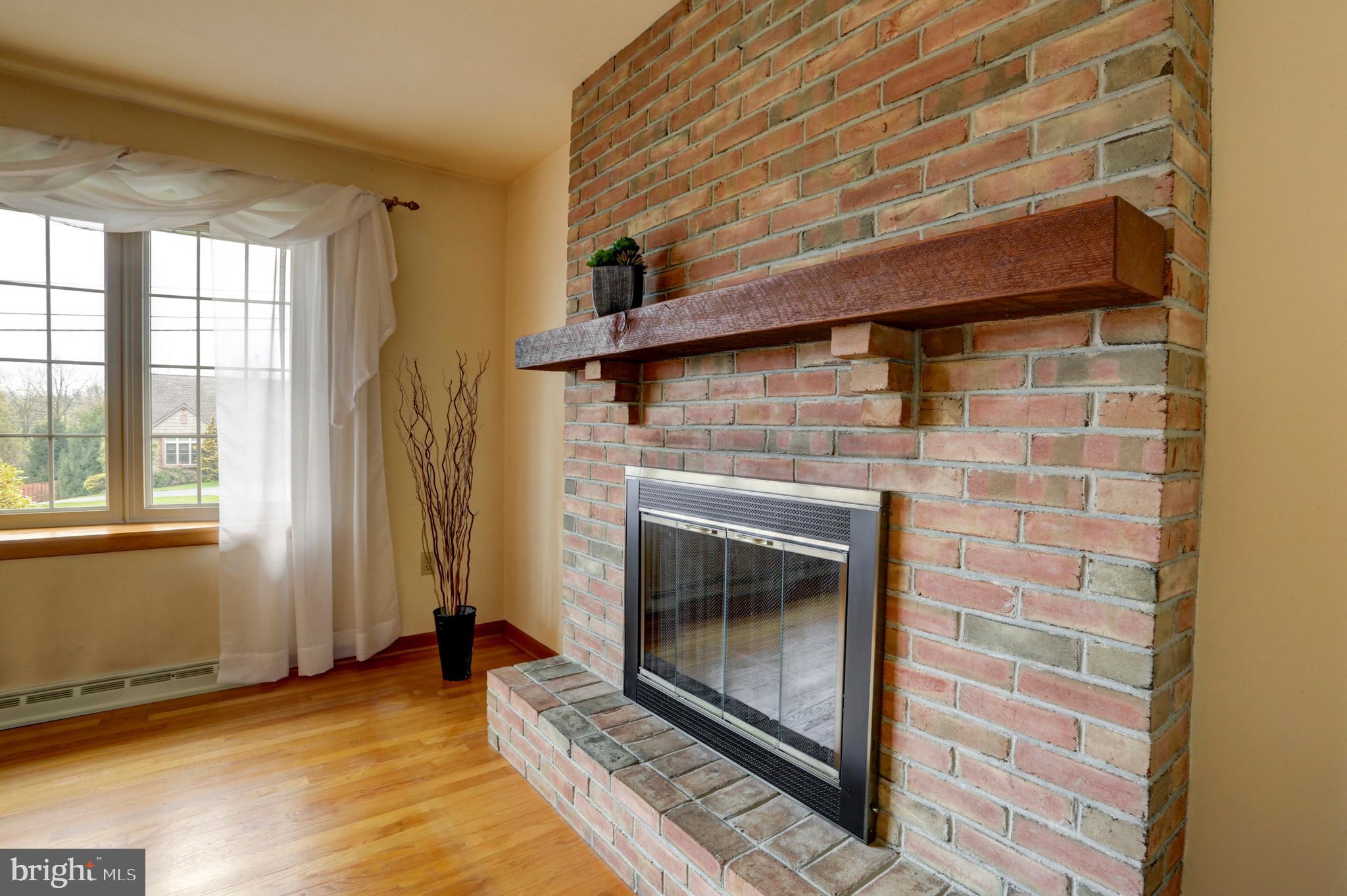 10 Snyder Hill Road Lititz, PA 17543 - Photo 8 of 38 Understated Fireplace anchors this room!