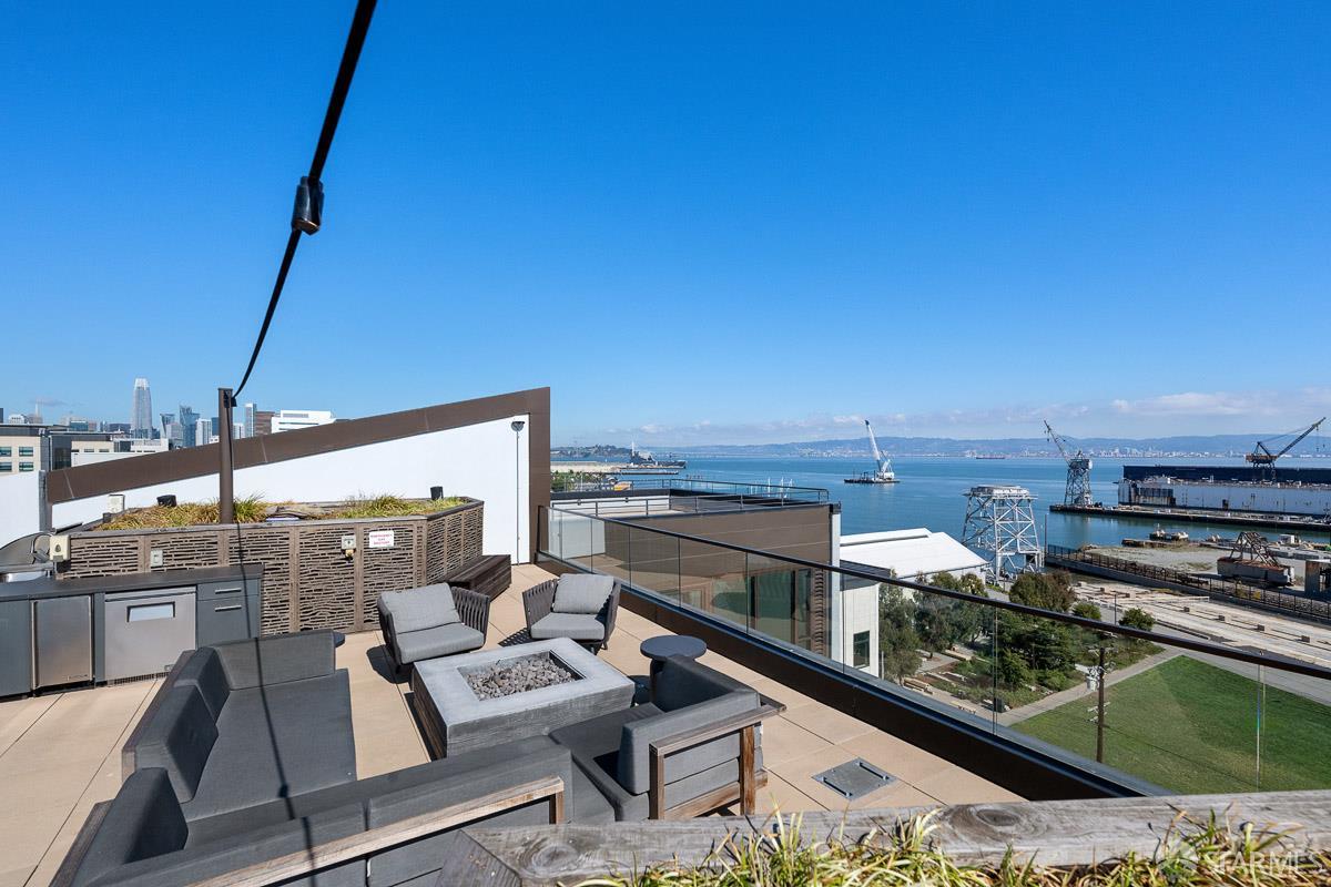 2177 3rd Street, Unit 609 San Francisco, CA 94107 - Photo 18 of 32 a view of a balcony with wooden floor and seating space
