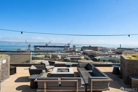 a view of a terrace with furniture