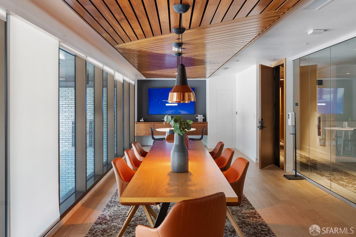 2177 3rd Street, Unit 609 San Francisco, CA 94107 - Photo 21 of 32 a dining room with furniture and wooden floor