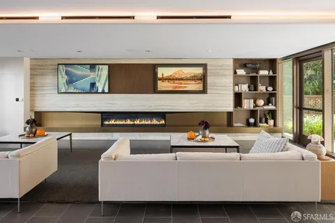 a view of a roof deck with couches