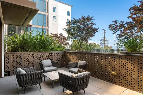a view of a brick building with many windows