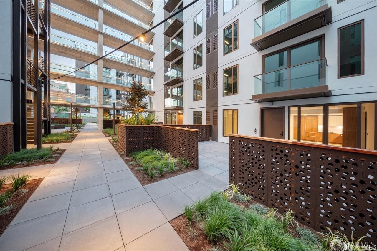 2177 3rd Street, Unit 609 San Francisco, CA 94107 - Photo 29 of 32 a view of a brick building with many windows