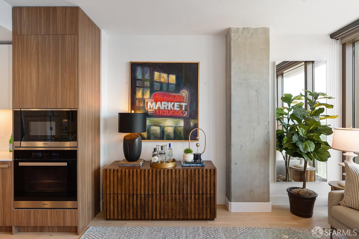 2177 3rd Street, Unit 609 San Francisco, CA 94107 - Photo 4 of 32 a bedroom with furniture and a potted plant