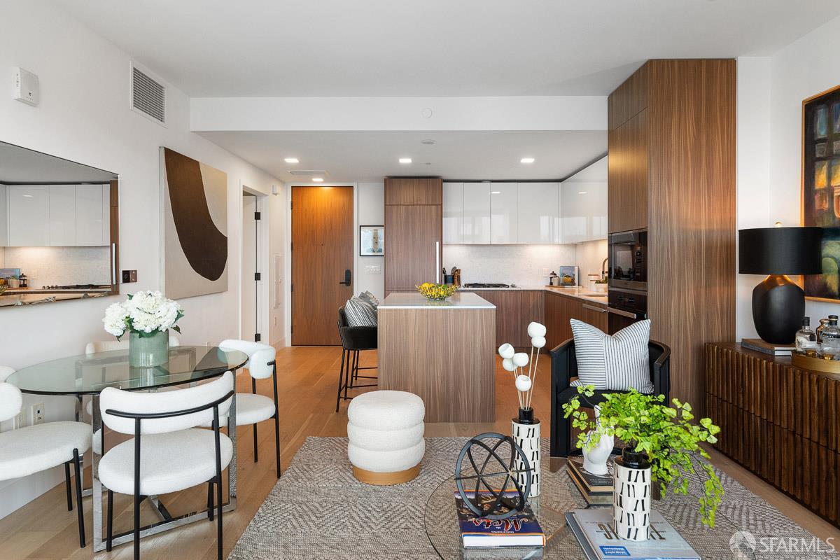 2177 3rd Street, Unit 609 San Francisco, CA 94107 - Photo 6 of 32 a living room with furniture and a potted plant