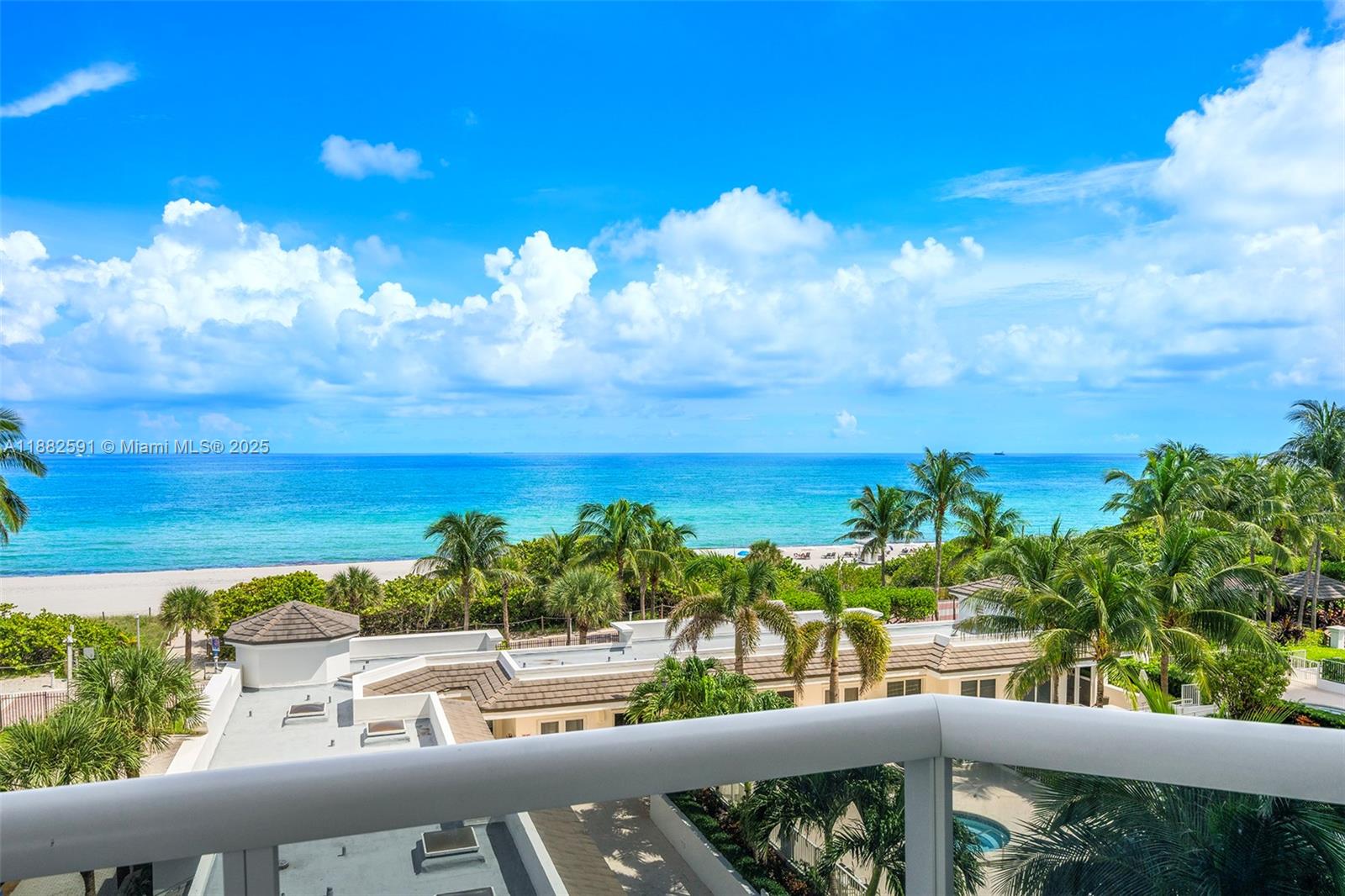 4779 Collins Avenue, Unit 501 Miami Beach, FL 33140 - Photo 14 of 45 a view of a city from a balcony
