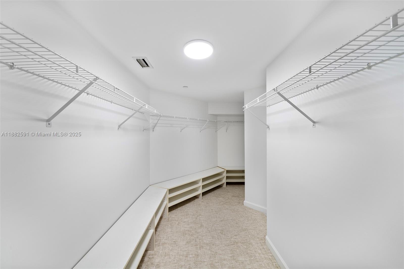 4779 Collins Avenue, Unit 501 Miami Beach, FL 33140 - Photo 18 of 45 a view of a room with racks on the wall