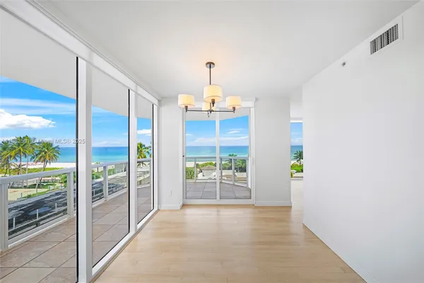 a view of an empty room and window