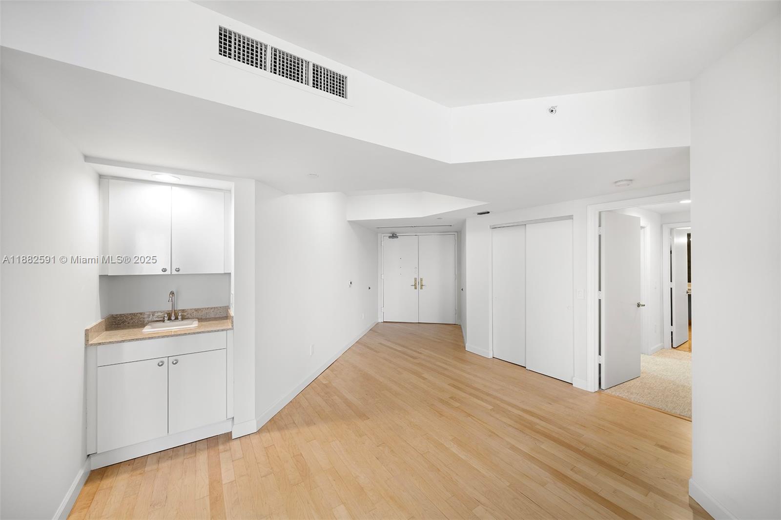 4779 Collins Avenue, Unit 501 Miami Beach, FL 33140 - Photo 7 of 45 a view of a kitchen with a sink