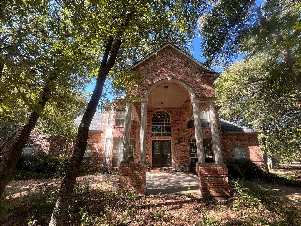 341 Rolling Oaks Ridge Cedar Hill, TX 75104 - Photo 2 of 27 View of front of house featuring brick siding and french doors