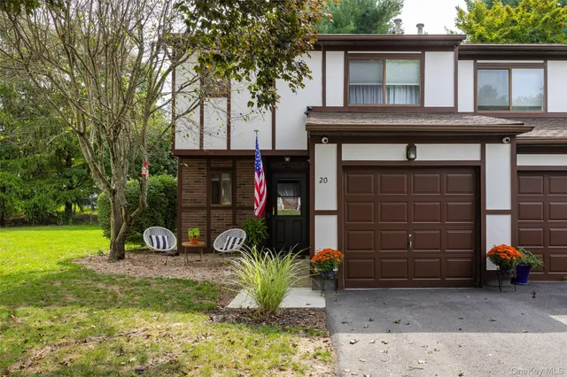 a house view with a garden space