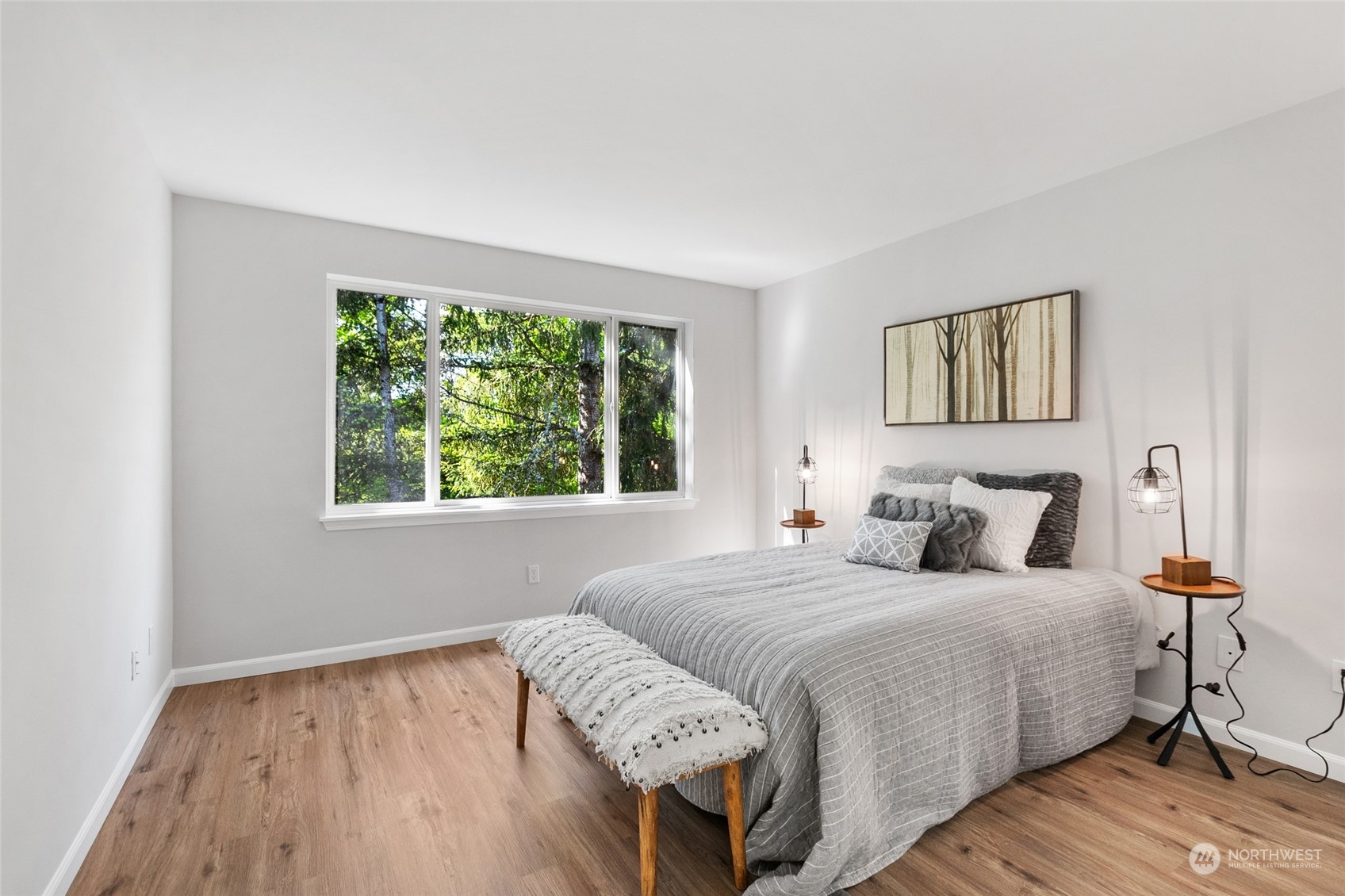 4623 Northeast 6th Court Renton, WA 98059 - Photo 31 of 40 a bedroom with a bed and a window