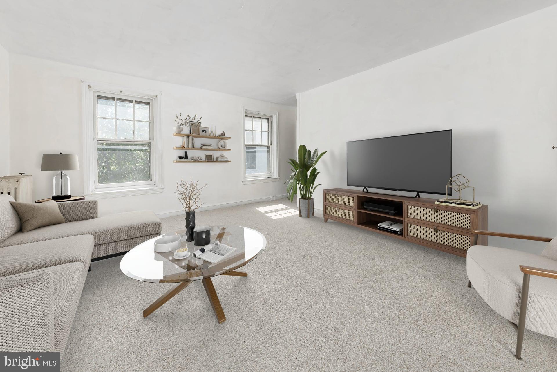 401 West Avenue Delanco, NJ 08075 - Photo 13 of 19 a living room with furniture a flat screen tv and a window