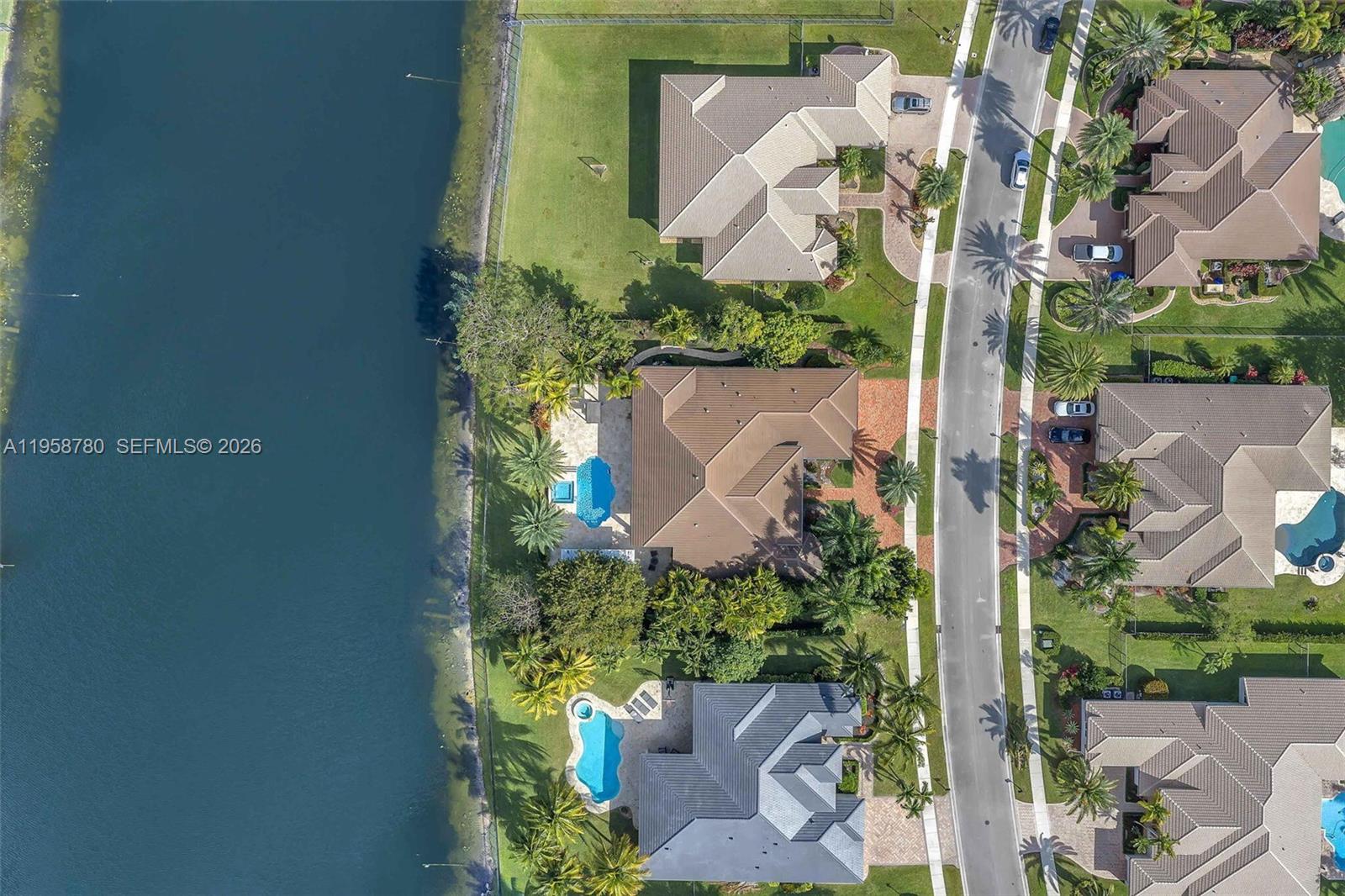 14931 Southwest 38th Street Davie, FL 33331 - Photo 15 of 82 an aerial view of a house with a yard and garden