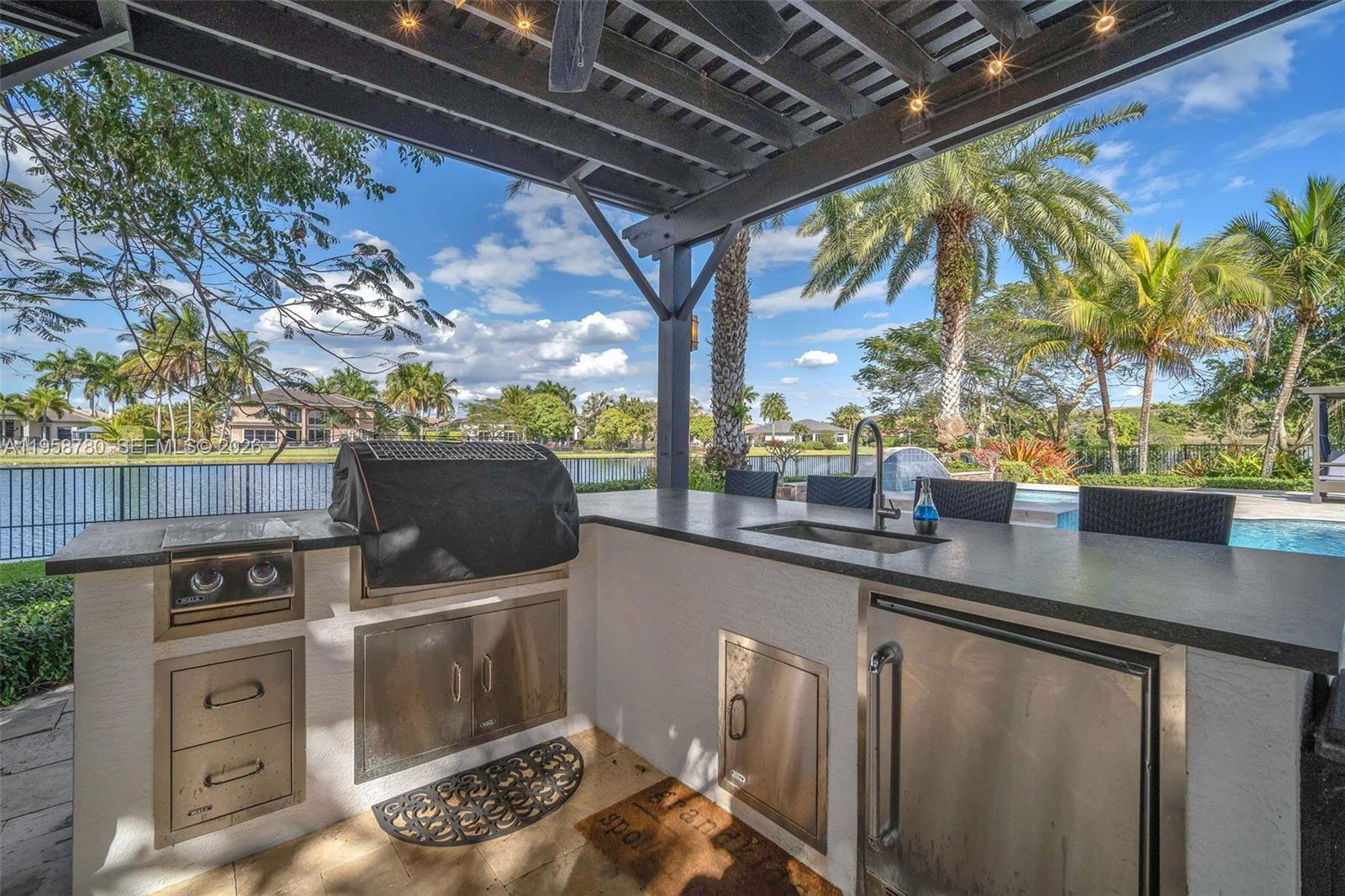 14931 Southwest 38th Street Davie, FL 33331 - Photo 26 of 82 a view of a kitchen with a sink and dishwasher