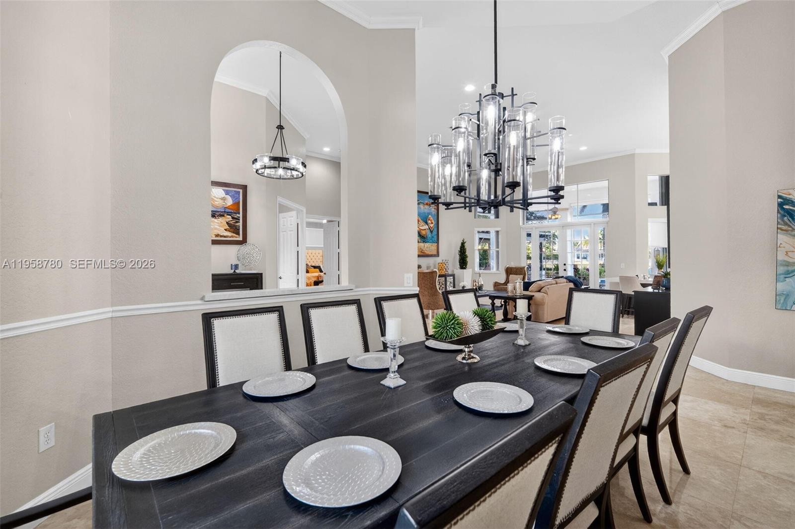 14931 Southwest 38th Street Davie, FL 33331 - Photo 43 of 82 a view of a dining room with furniture and wooden floor