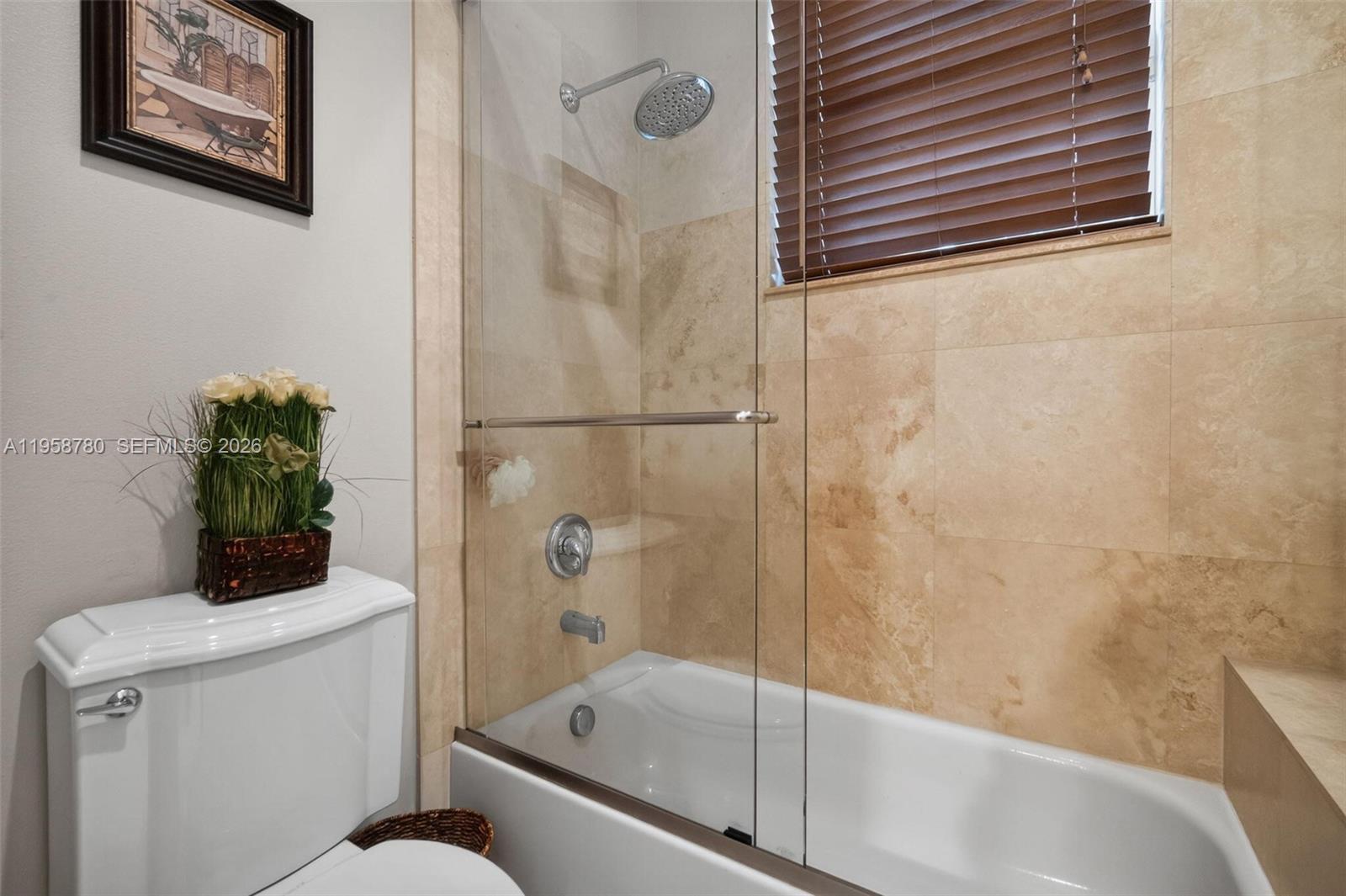14931 Southwest 38th Street Davie, FL 33331 - Photo 70 of 82 a bathroom with a bathtub and shower