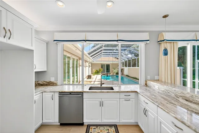 a view of a patio with a table and chairs