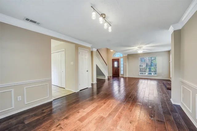 a bathroom with a sink a mirror a toilet and a mirror