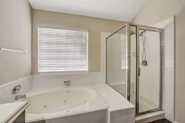 a bathroom with a sink a vanity and a mirror