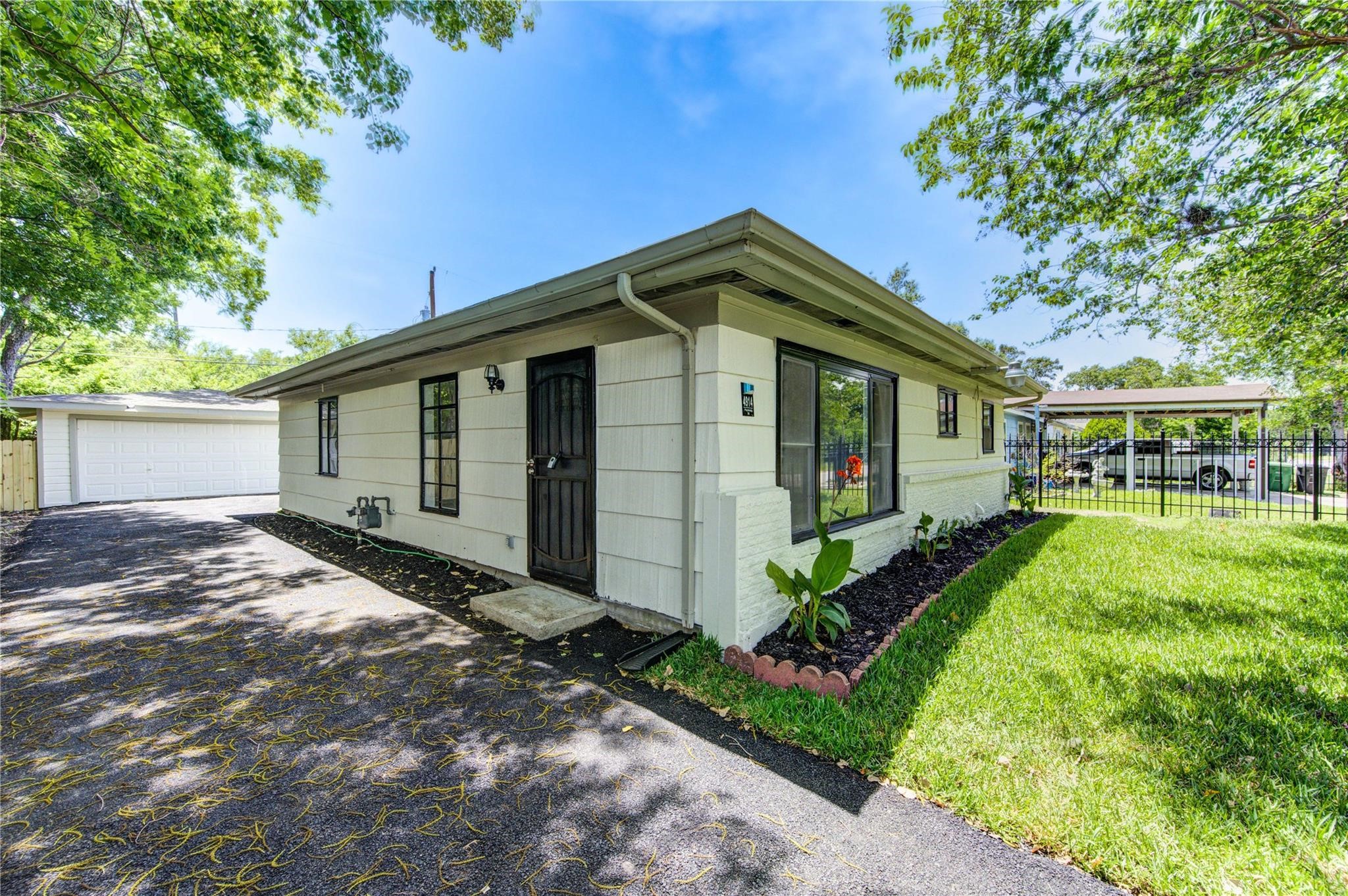 a front view of house with yard