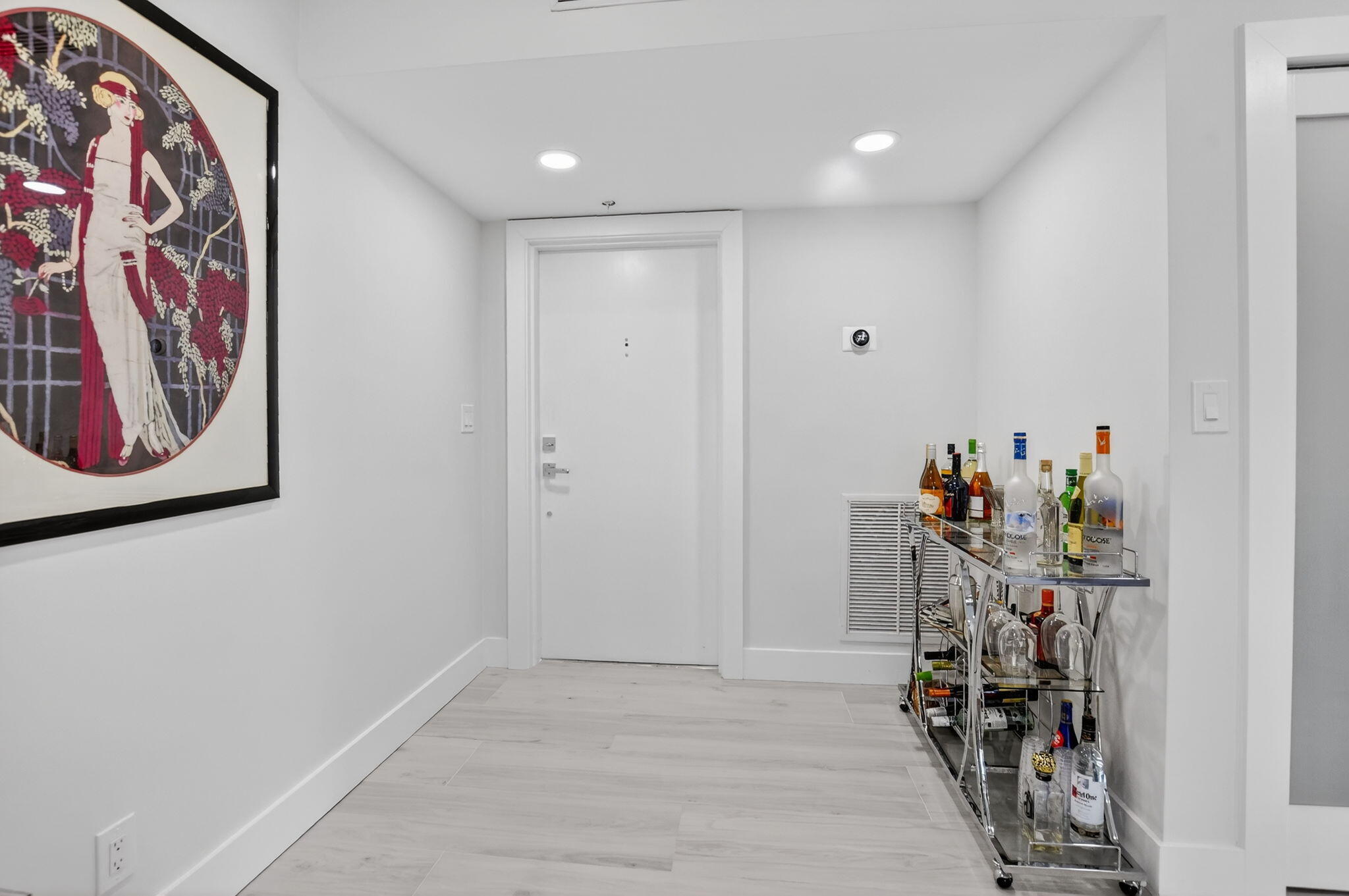 a view of a hallway with shelves