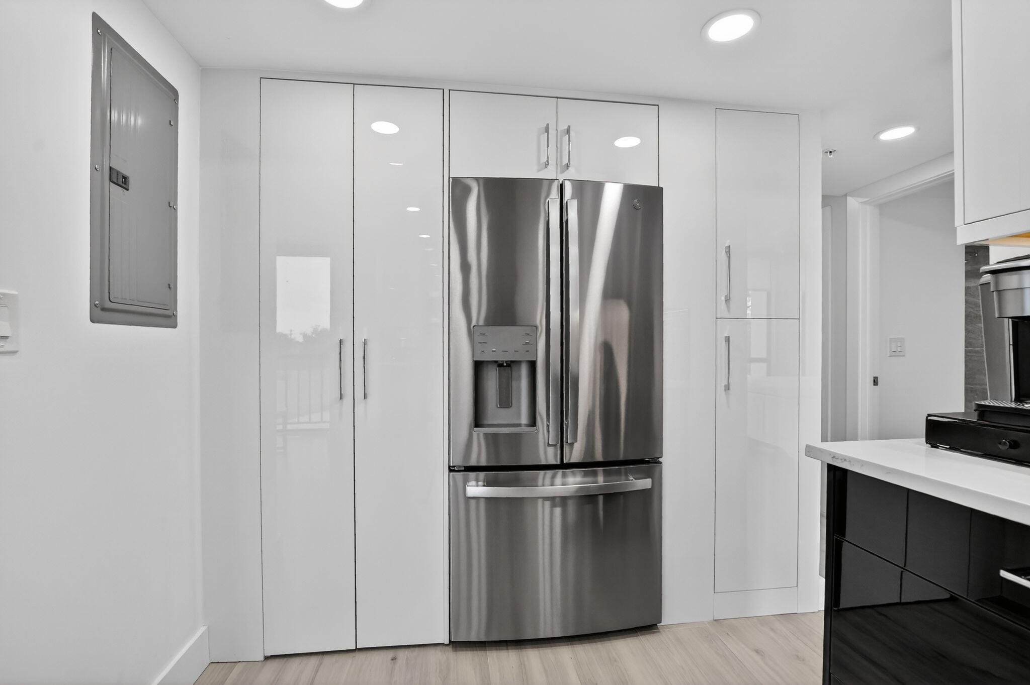 7802 Lakeside Boulevard, Unit 734 Boca Raton, FL 33434 - Photo 11 of 34 a kitchen with stainless steel appliances a refrigerator and cabinets