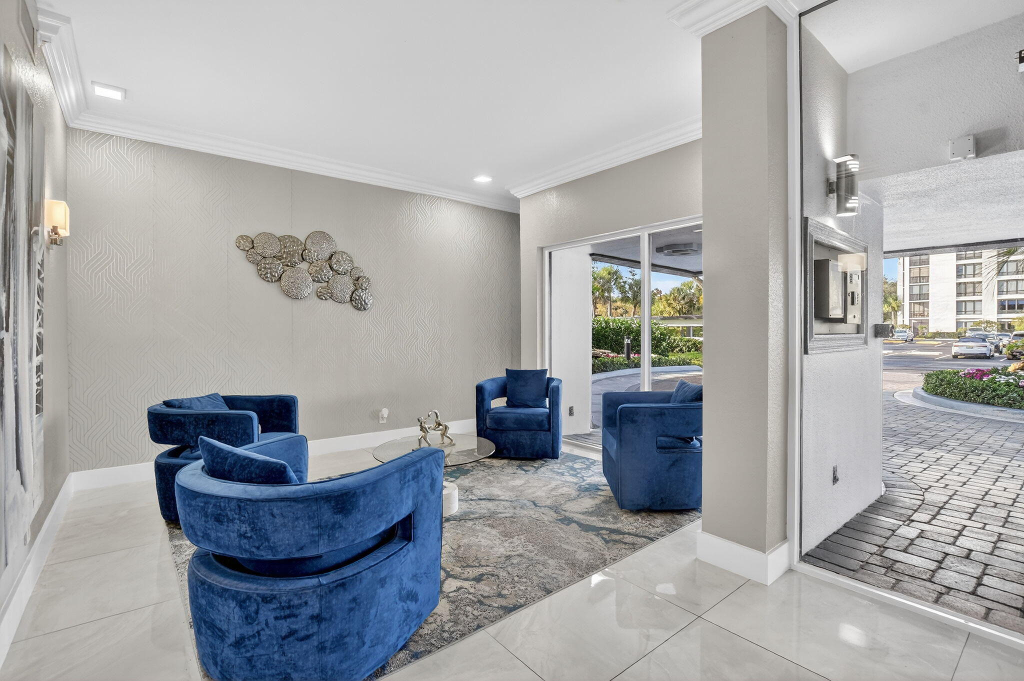 7802 Lakeside Boulevard, Unit 734 Boca Raton, FL 33434 - Photo 33 of 34 a living room with furniture and a window