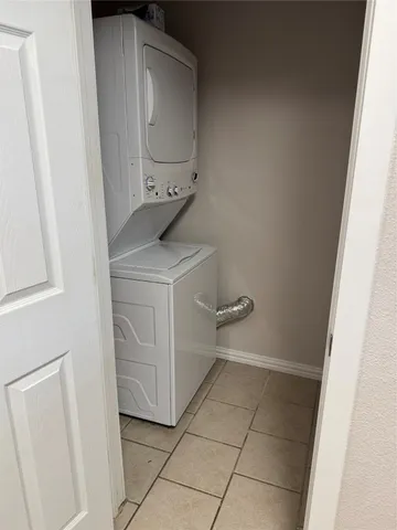 a kitchen with stainless steel appliances a sink and cabinets