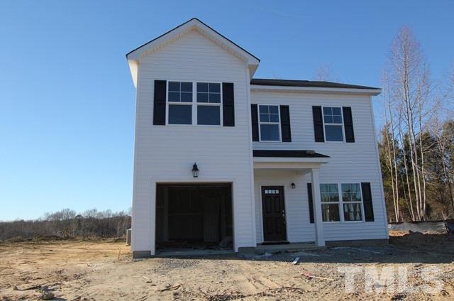6204 Cotter Ridge Court Raleigh, NC 27603 - Photo 1 of 21 a front view of a house