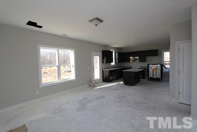6204 Cotter Ridge Court Raleigh, NC 27603 - Photo 2 of 21 a view of workspace with furniture and window