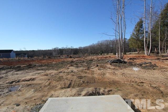 6204 Cotter Ridge Court Raleigh, NC 27603 - Photo 17 of 21 a view of a dry yard with wooden fence
