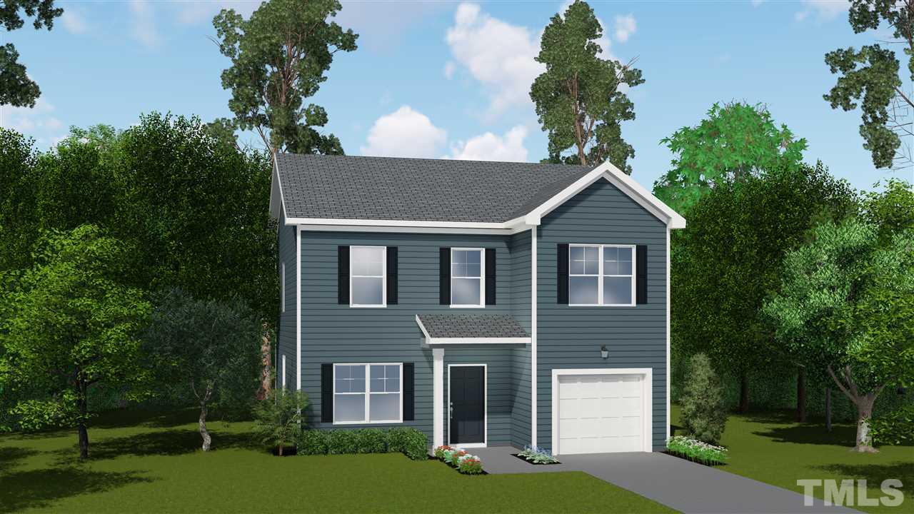 6204 Cotter Ridge Court Raleigh, NC 27603 - Photo 18 of 21 a front view of a house with garden