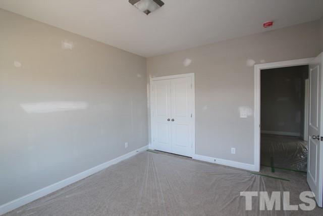 6204 Cotter Ridge Court Raleigh, NC 27603 - Photo 9 of 21 a view of an empty room