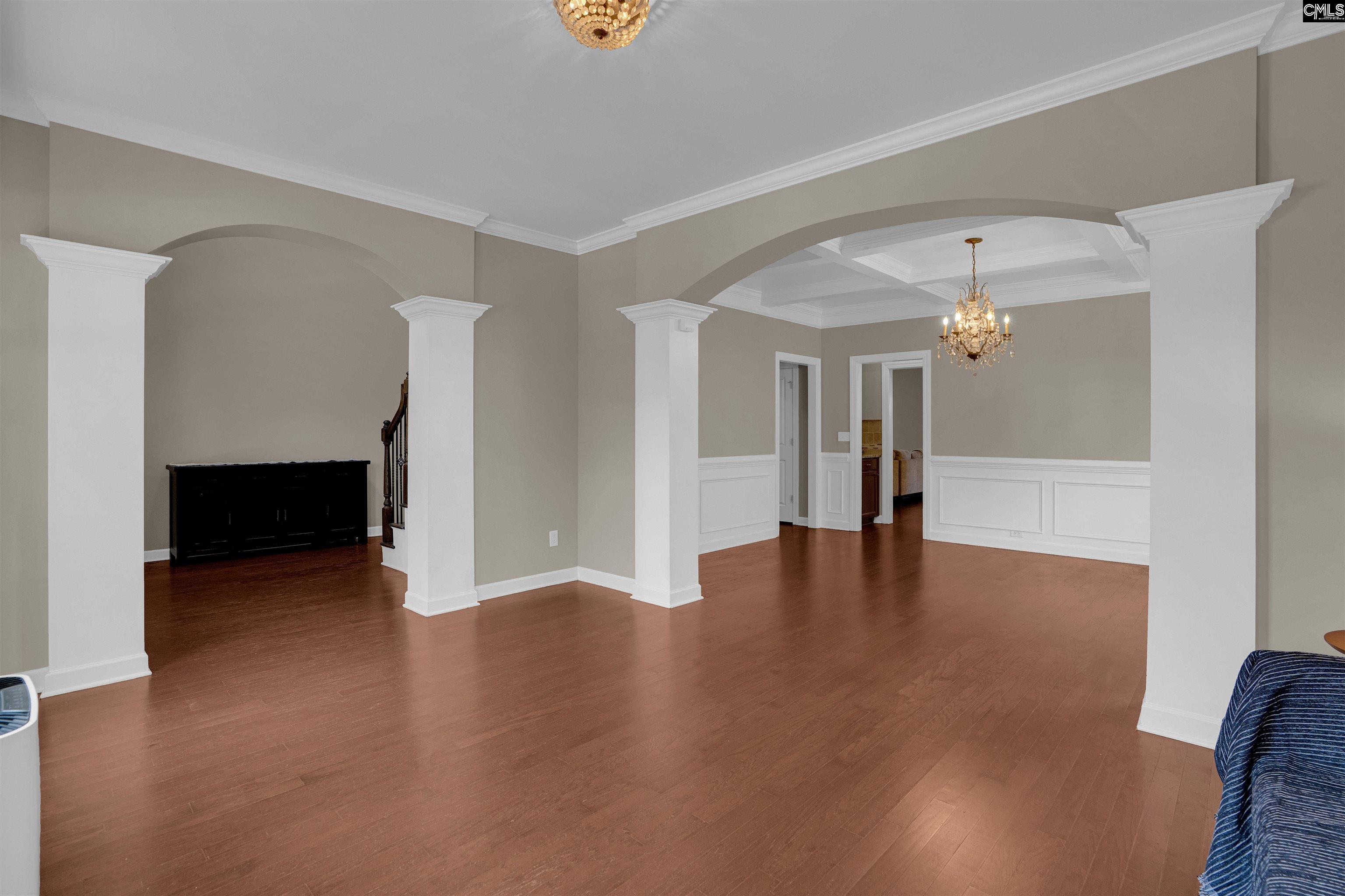 321 Asa Rose Lexington, SC 29072 - Photo 6 of 52 a view of a livingroom with wooden floor and a fireplace