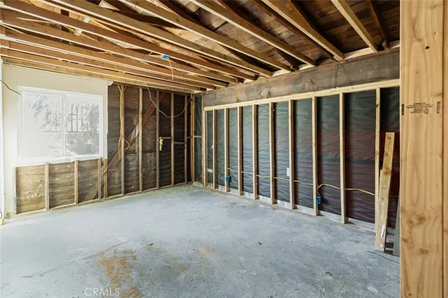 a view of porch with wooden floor