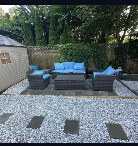 a backyard of a house with seating space