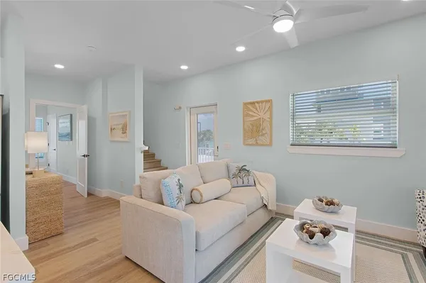 a kitchen with a stove a sink and a refrigerator
