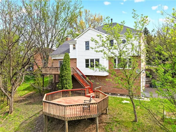 a house view with a garden space