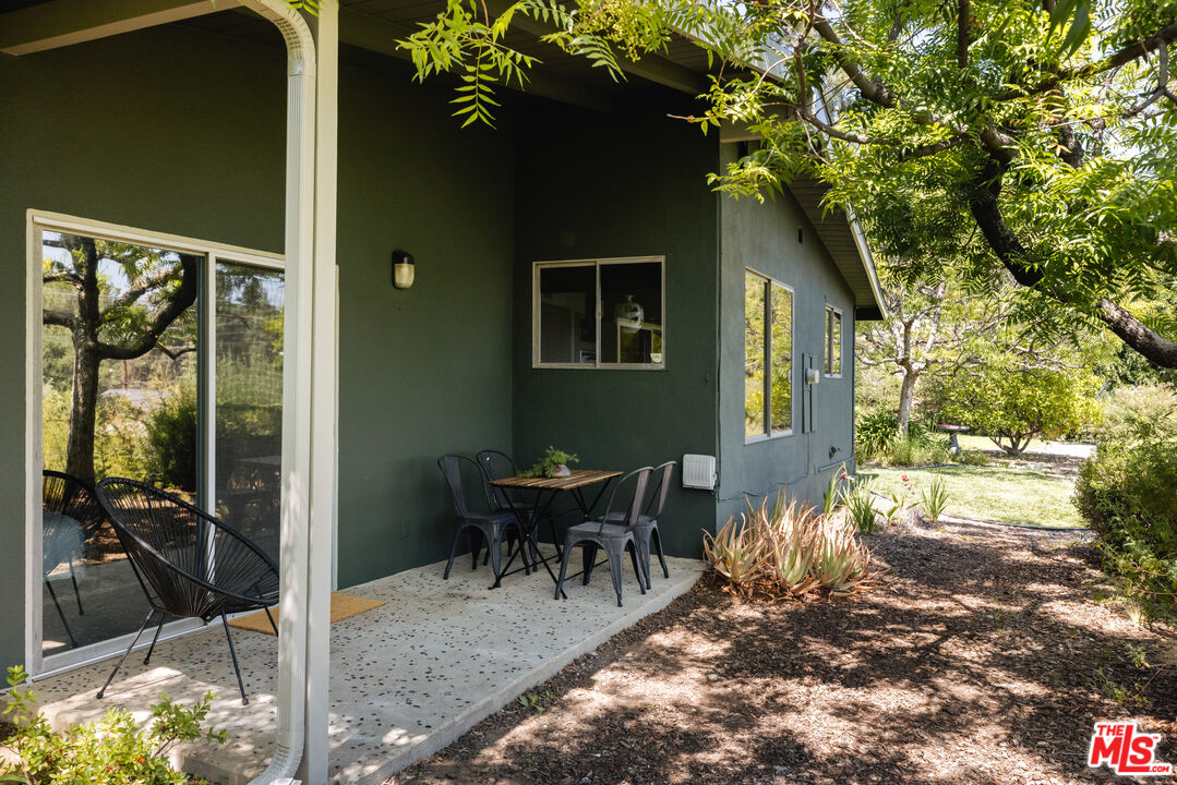 580 Cocopan Drive Altadena, CA 91001 - Photo 22 of 29 a view of a house with backyard porch and patio