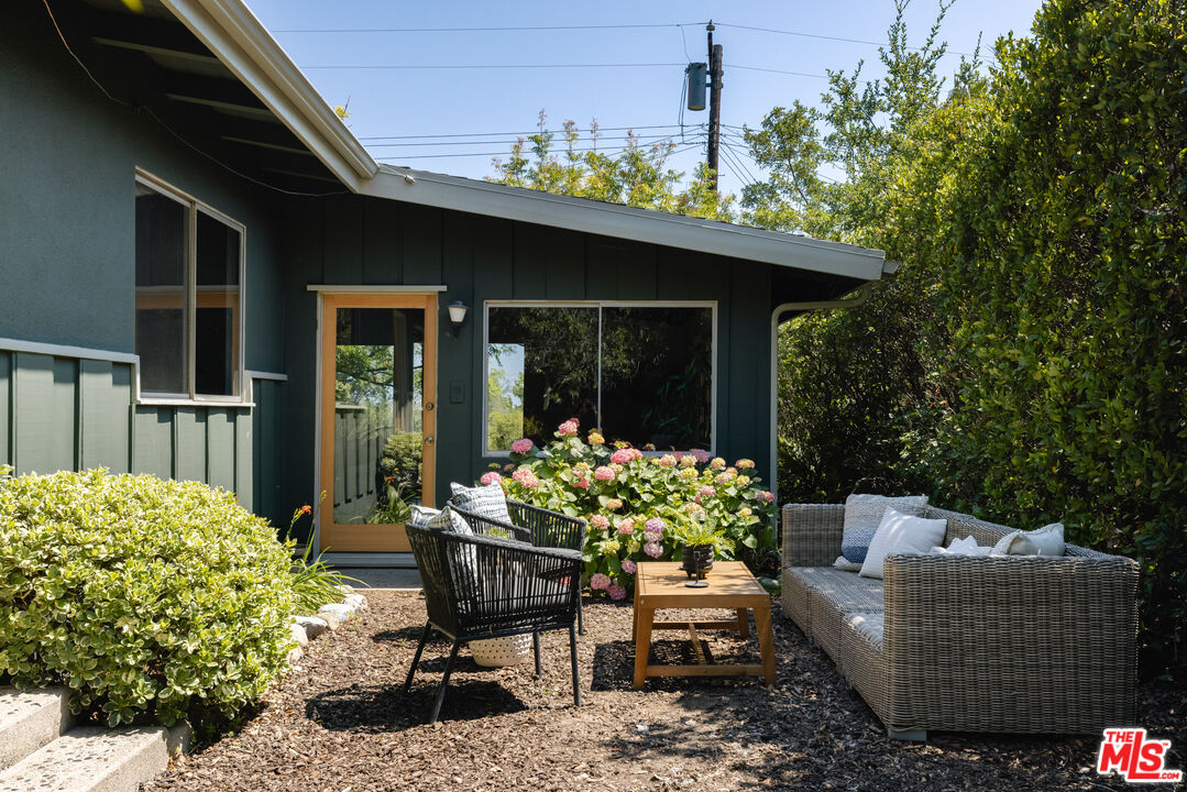 580 Cocopan Drive Altadena, CA 91001 - Photo 23 of 29 a front view of a house with patio
