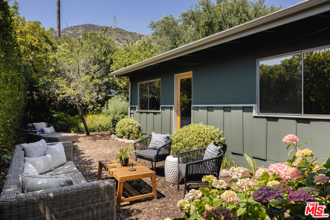 580 Cocopan Drive Altadena, CA 91001 - Photo 24 of 29 a outdoor living space with furniture potted plant and outdoor seating