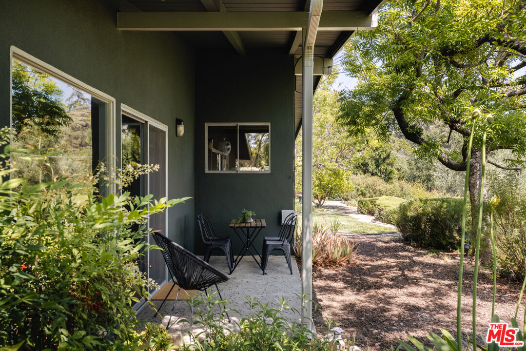 580 Cocopan Drive Altadena, CA 91001 - Photo 28 of 29 a living room with furniture and a window