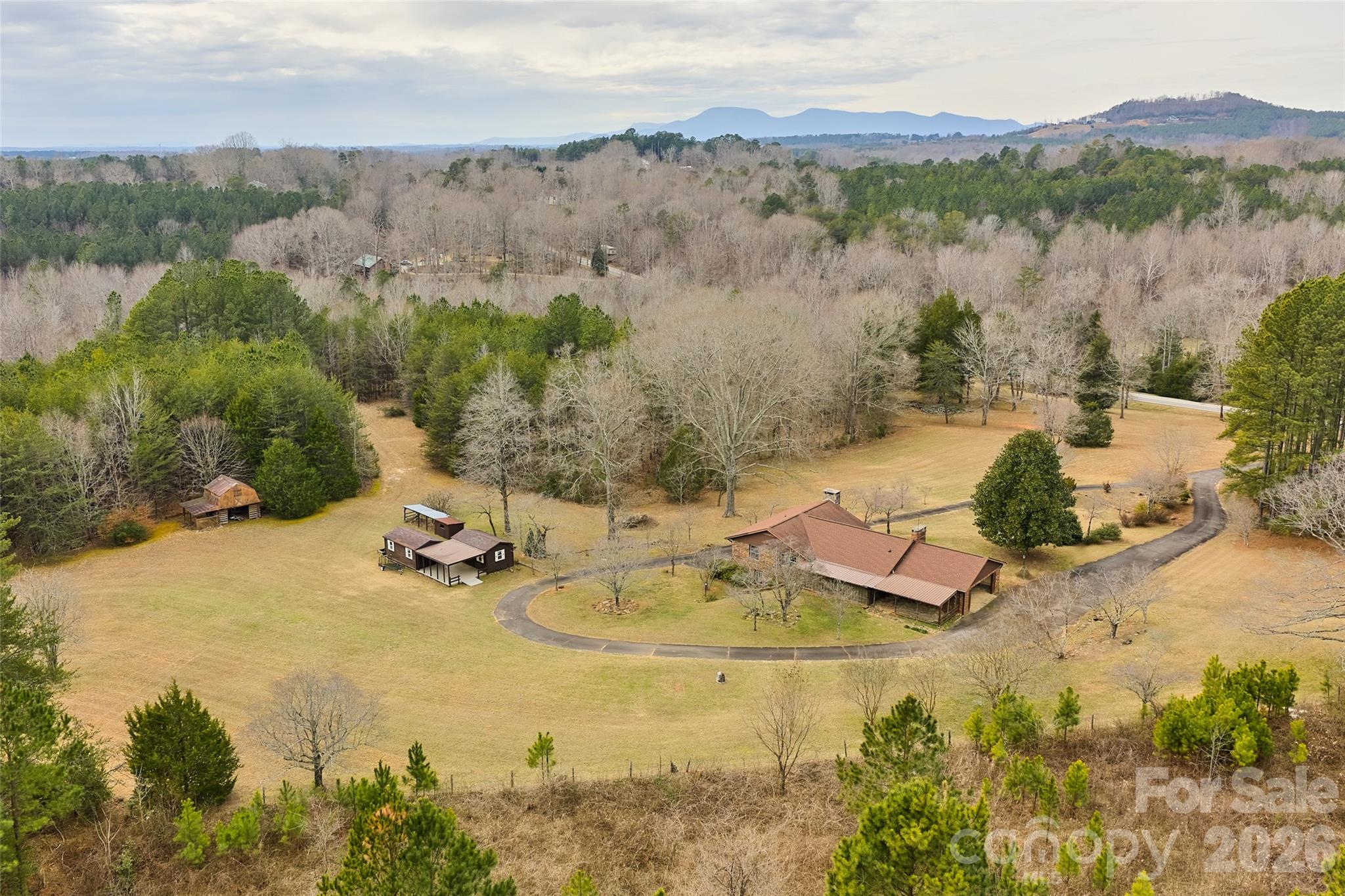 591 Landrum Road Tryon, NC 28782 - Photo 1 of 48 a view of lake and mountain
