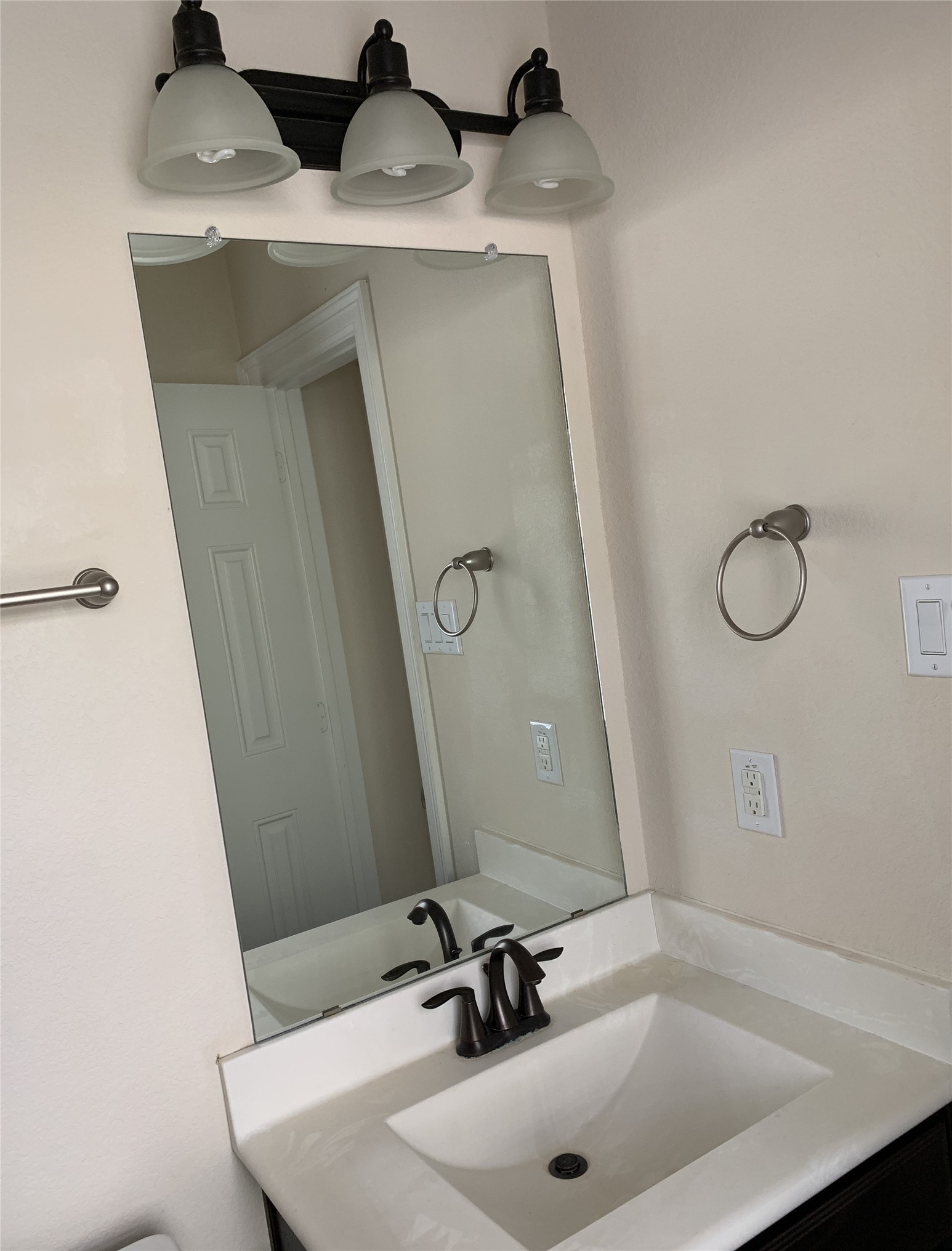3021 Kisling Street Houston, TX 77021 - Photo 23 of 27 a bathroom with a sink and a mirror