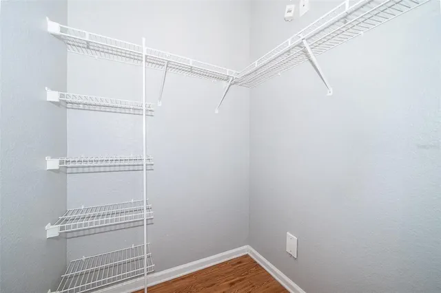 a view of a room with racks on the wall