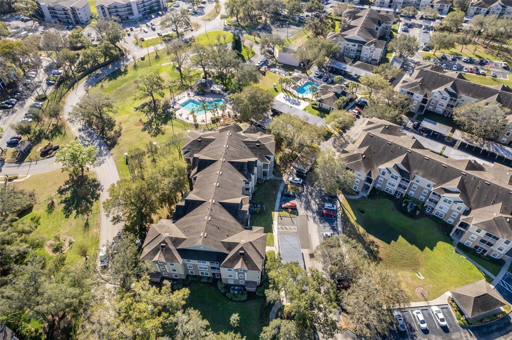 581 Brantley Terrace Way, Unit 202 Altamonte Springs, FL 32714 - Photo 25 of 25 an aerial view of a house with a yard