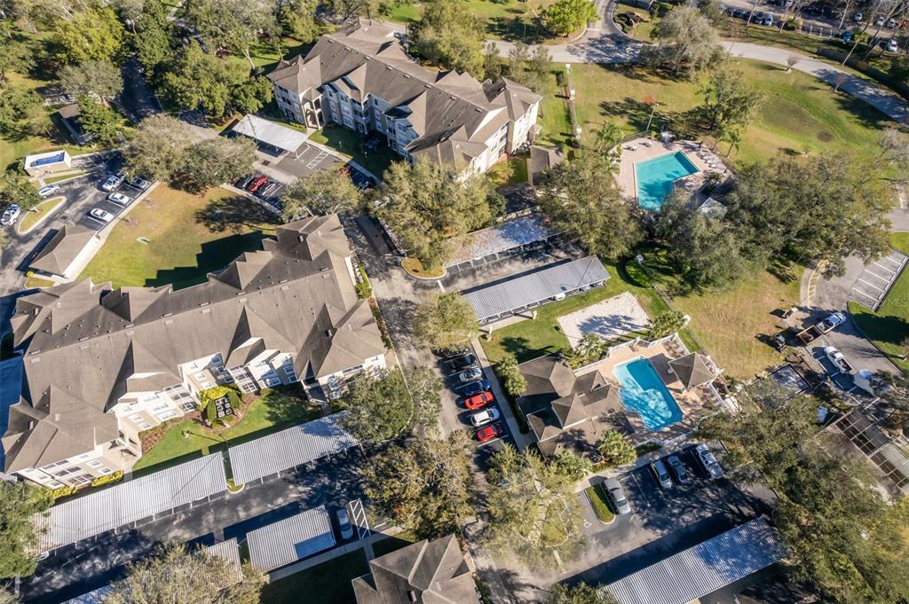 581 Brantley Terrace Way, Unit 202 Altamonte Springs, FL 32714 - Photo 3 of 25 an aerial view of residential houses with outdoor space
