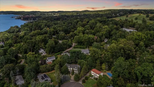 an aerial view of house with yard