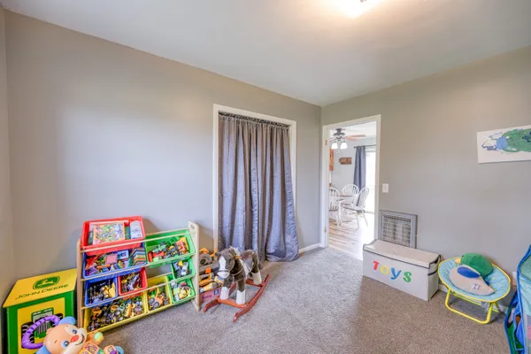 a kids room with toys and toys